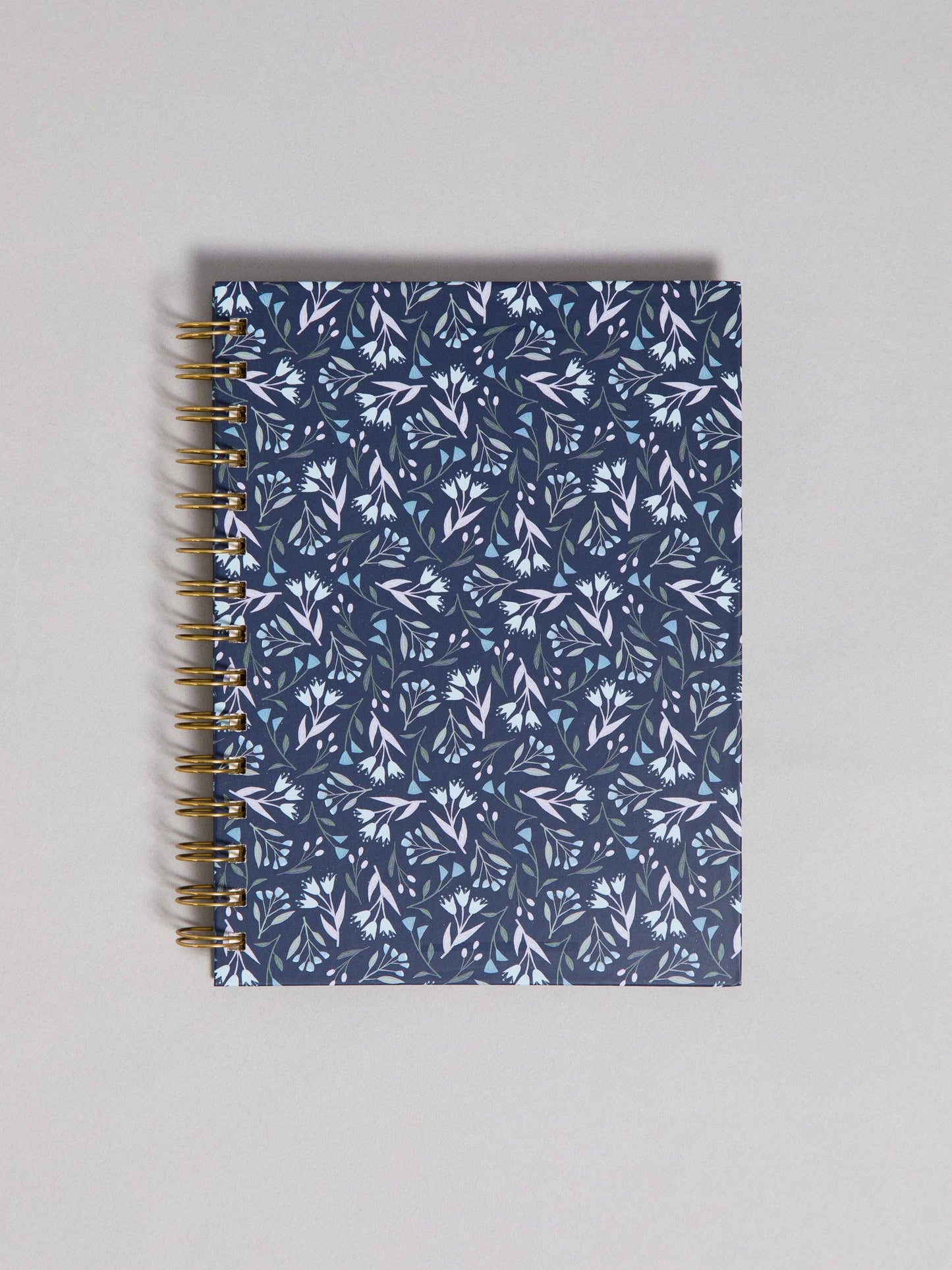 front cover of floral spiral notebook